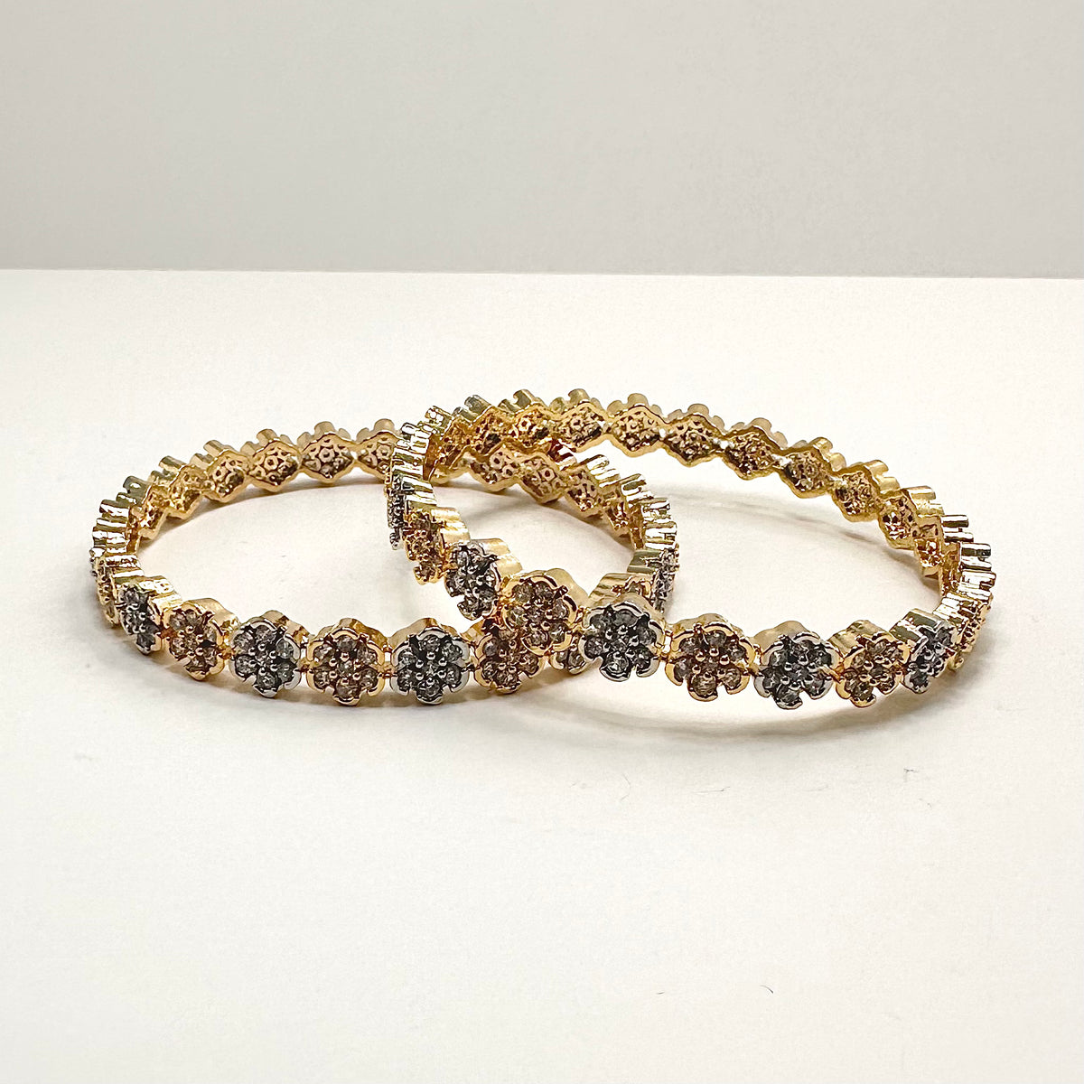 Rosey Zircon Gold Bangles