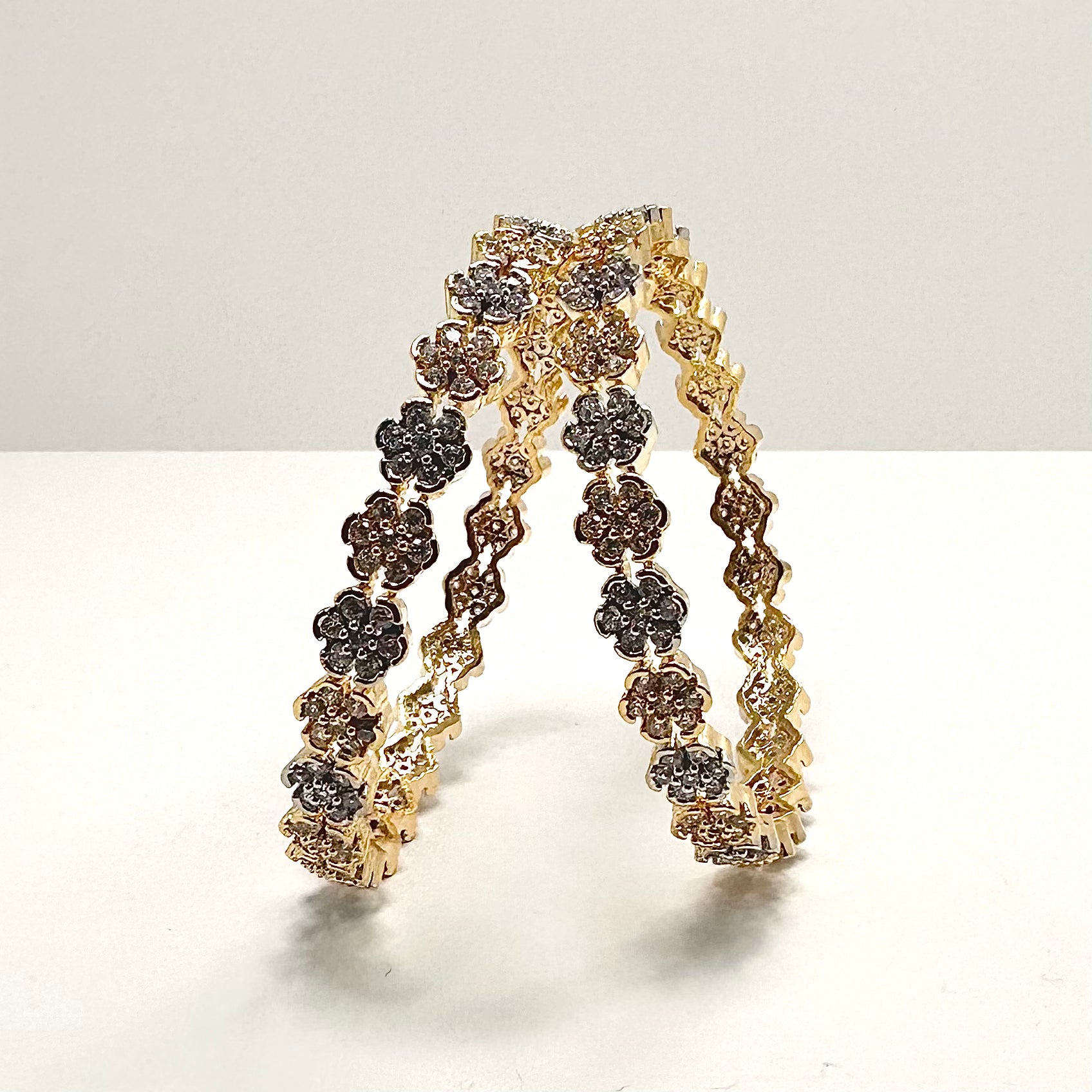 Rosey Zircon Gold Bangles