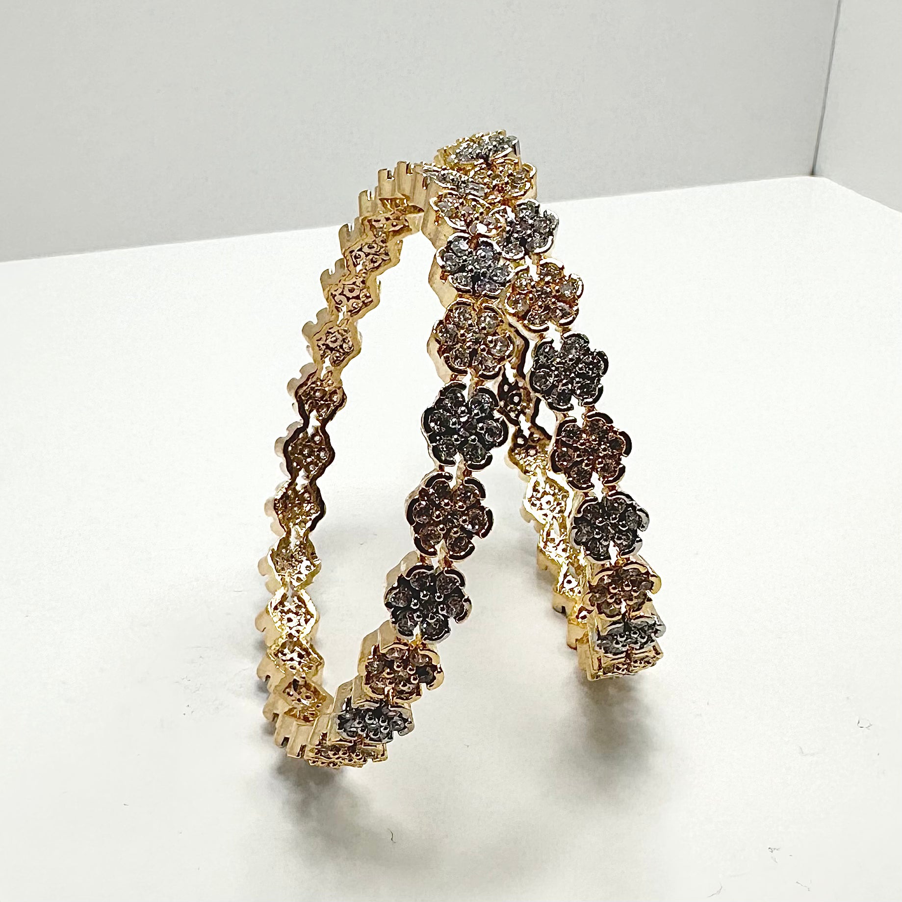 Rosey Zircon Gold Bangles